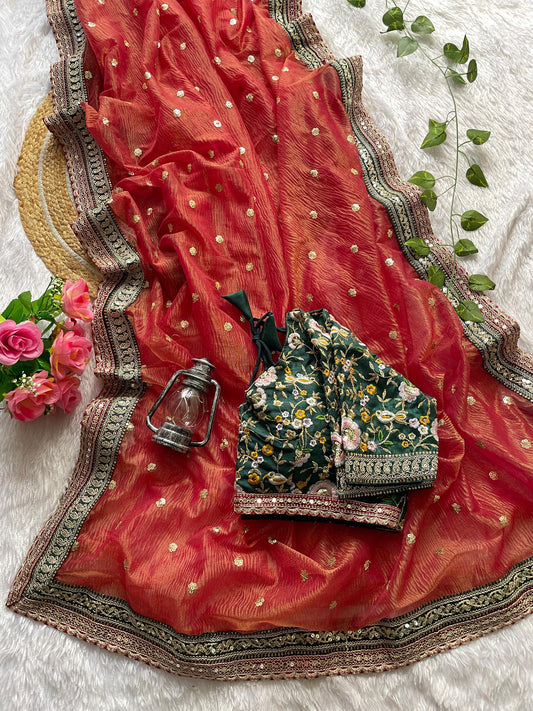 Rustic Terracotta Designer Saree with Floral Embroidered Emerald Blouse