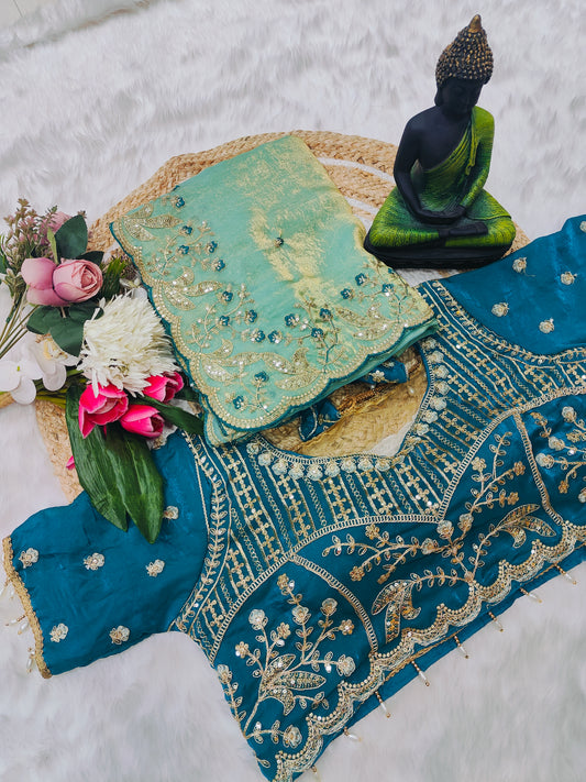 Sea Green Organza Saree with Peacock Blue Embroidered Designer Blouse